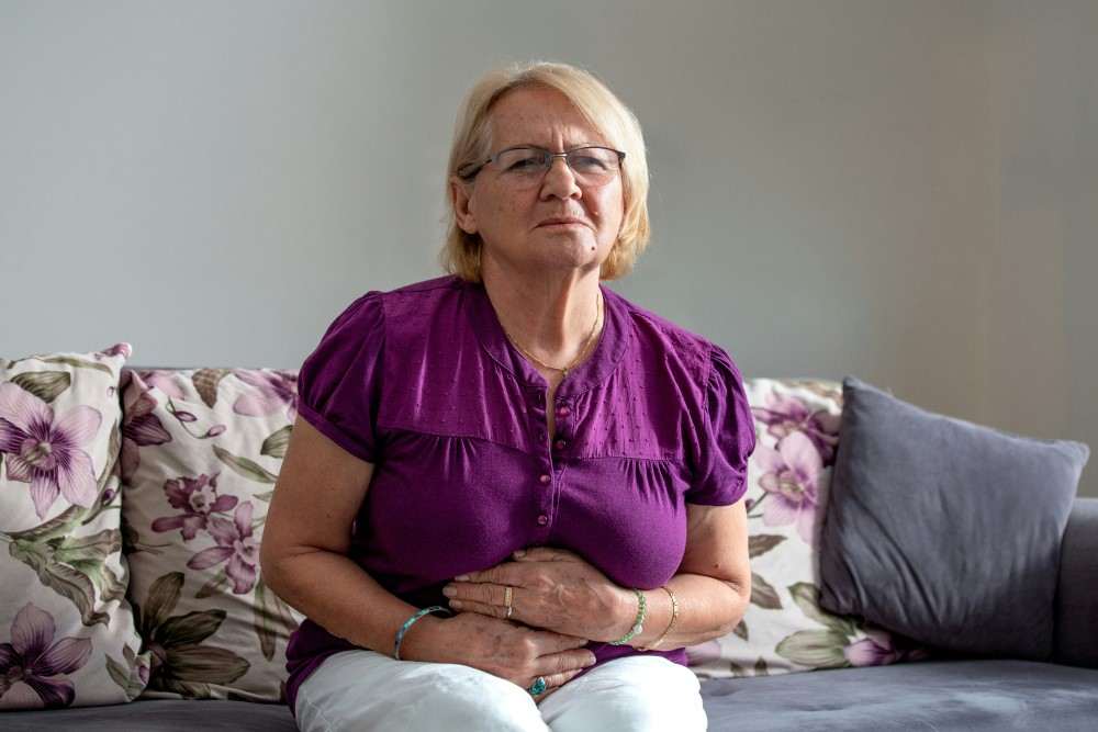 Présentation d'une femme présentant des douleurs abdominales pour cancer de l'estomac