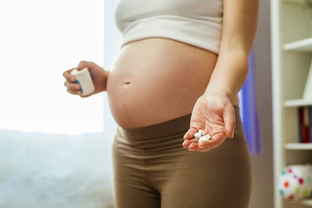 Femme enceinte qui prend du Doliprane